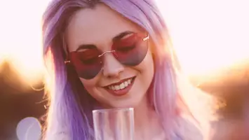 photo of woman with pastel purple hair color