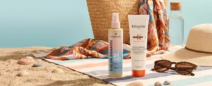 Hair products displayed to protect hair from sun damage, including serums from Pureology and Kerastase.