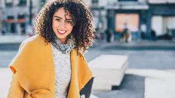 photo of latina woman with curly hair