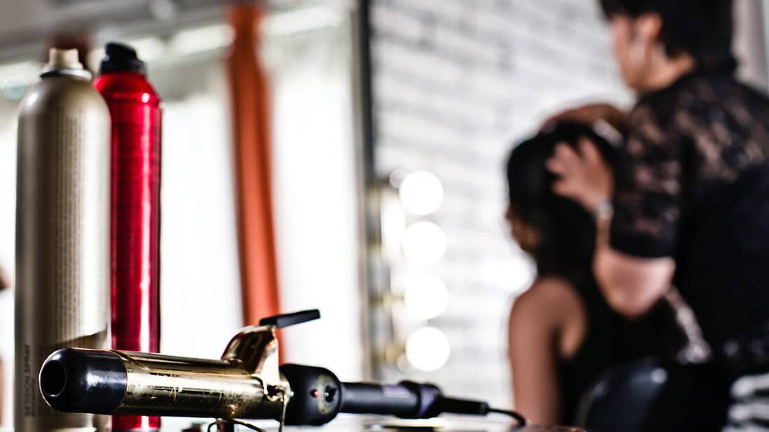 photo of stylist in salon Redken Escada fashion week