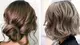 two women with mushroom brown hair from behind