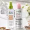 A clean and bright bathroom countertop/sink area featuring various hair accessories like a hair brush, hair clips, comb, scrunchie, etc. Also showing products mentioned in the article like: EverPure Glossing Treatment and Diamond Sleek Spray