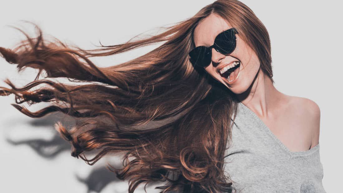 photo of woman with silky hair how to get silky hair