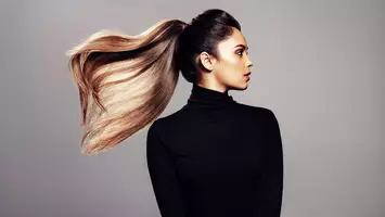 photo of woman with thick ponytail