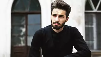 photo of man with pompadour hairstyle
