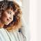 photo of woman with dry curly hair