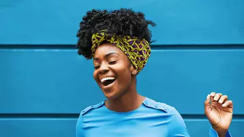 photo of women with 4C curly hair texture