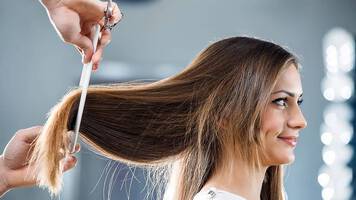 woman getting her hair cut