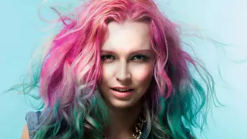 woman with pink and green hair