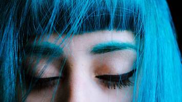 girl with bright blue bangs hair style