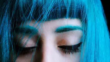 girl with bright blue bangs hair style
