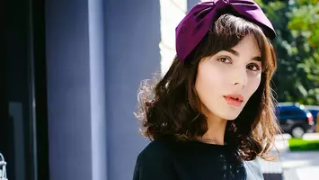 photo of woman with hair bow