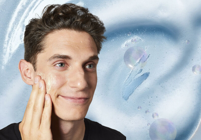 photo of stylist cutting hair in salon