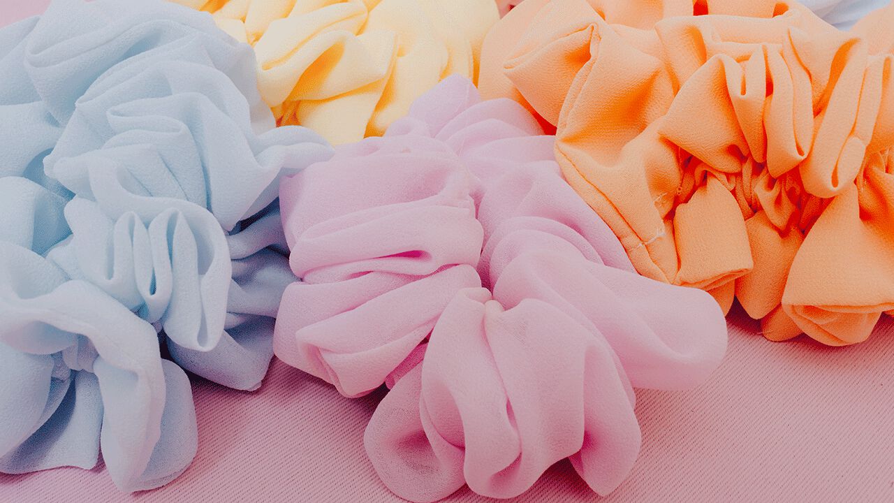 photo of women wearing hair scrunchies