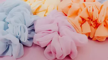 photo of women wearing hair scrunchies