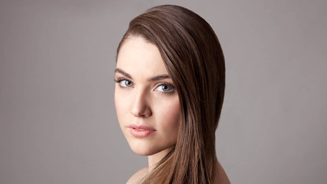 photo of woman with brown oily hair