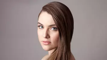 photo of woman with brown oily hair