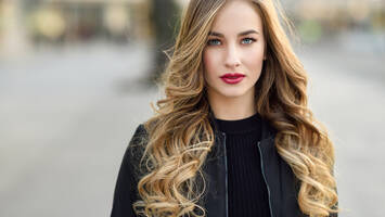 photo of woman with face framing blonde highlights