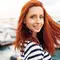 photo of woman with bright red hair color