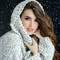 woman with long brown hair in the snow