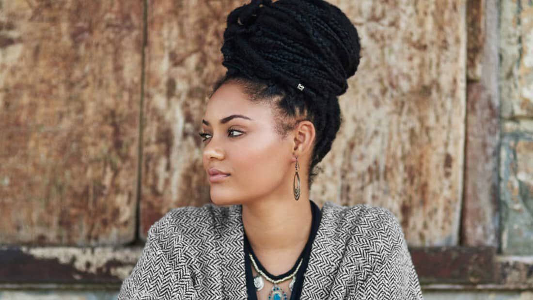 photo of woman with long braids