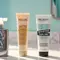 of Color Wow Anti-Frizz Spray for Curly Hair, Mizani Curl Enhancing Lotion, Redken Sculpting Curl Gel, and/or L'Oreal Paris Curl Expression 10-In-1 Cream-In-Mousse) lined up on a bathroom counter. A window featuring a blazing sun pictured as well.