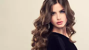 photo of woman with long brunette hair how to care for brunette hair