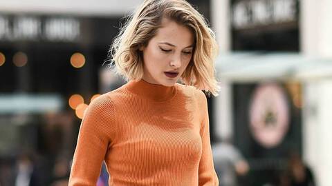 photo of fashionable woman with blunt haircut