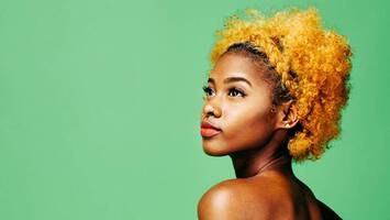 photo of woman with mustard yellow hair
