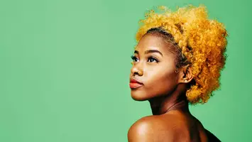 photo of woman with mustard yellow hair