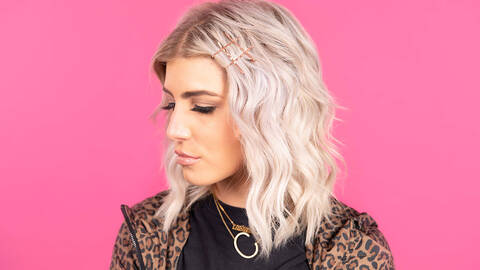 woman using bobby pins in hair