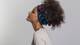 photo of woman with curly hair wearing head wrap accessory