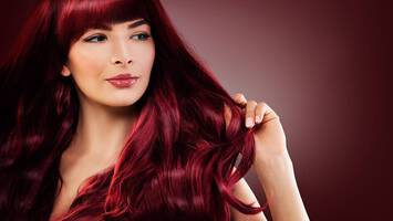 photo of woman with vibrant magenta hair color