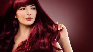 photo of woman with vibrant magenta hair color