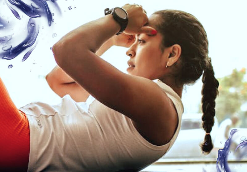 Image of woman in athletic clothing doing situps