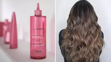 Woman brushing long brunette wavy thick hair