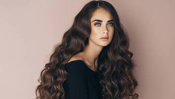 woman with long brown wavy hair