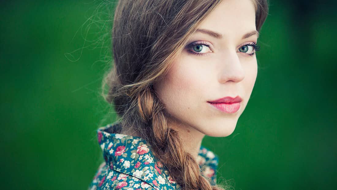 photo of woman with long braided hair