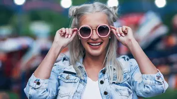 photo of woman with two buns hairstyle