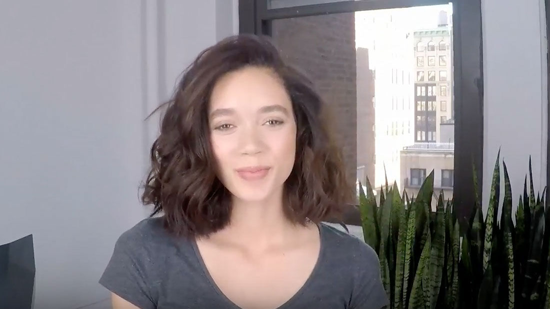 photo of woman with windblown waves