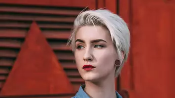 Girl with short grey hair