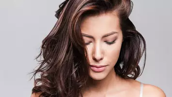 photo of woman with rose brown hair color