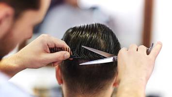 Man gets his hair cut