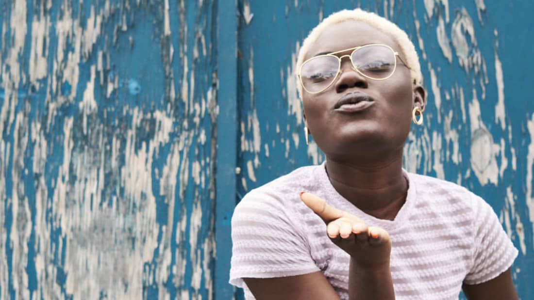 photo of blonde hair on dark skin