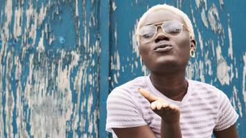 photo of blonde hair on dark skin