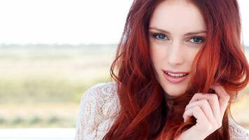 photo of woman with red wine hair color