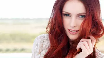 photo of woman with red wine hair color