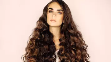 woman with color-matched hair extensions