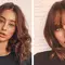 two brunette women with clavicle bob haircuts