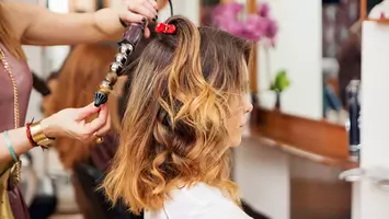 woman getting Mid-Length Hairstyle